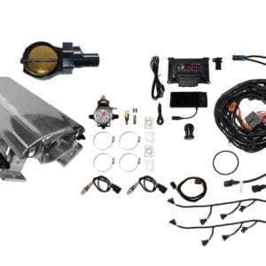 Car engine components and wiring kit laid out on a white background.