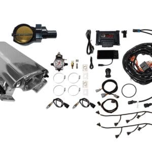 A collection of automotive engine parts and accessories laid out on a white background.