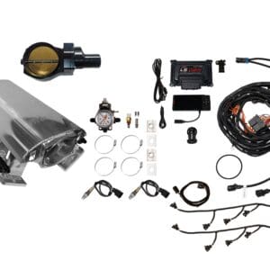Car engine parts and wiring components laid out on a white background.