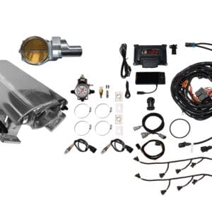 Complete automotive engine tuning kit with various components and wiring.