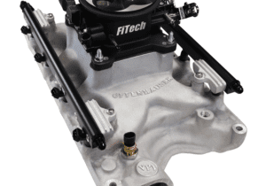 FiTech automotive engine component on display.